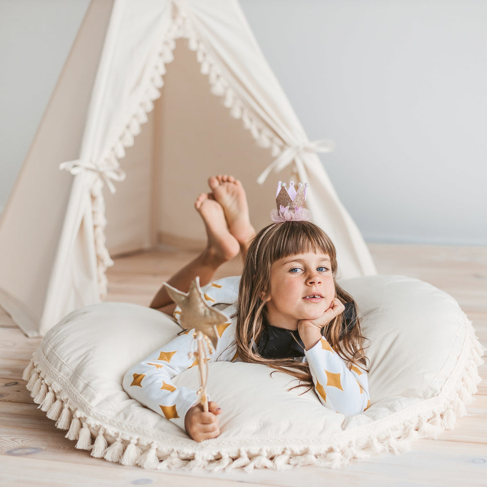 Grand coussin de sol avec pompons